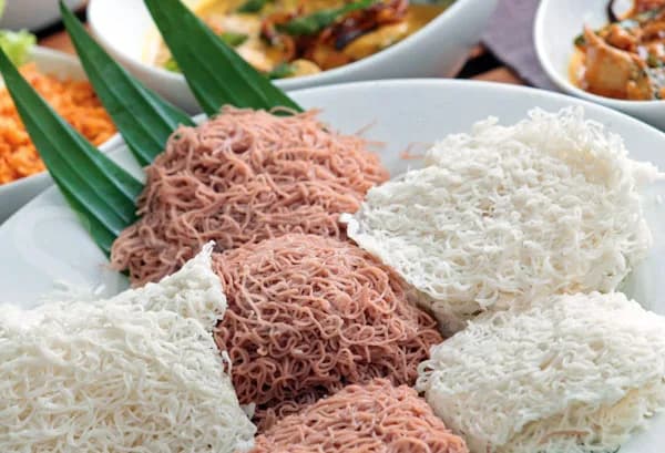 Beautiful white and red string hoppers in a clean bowl