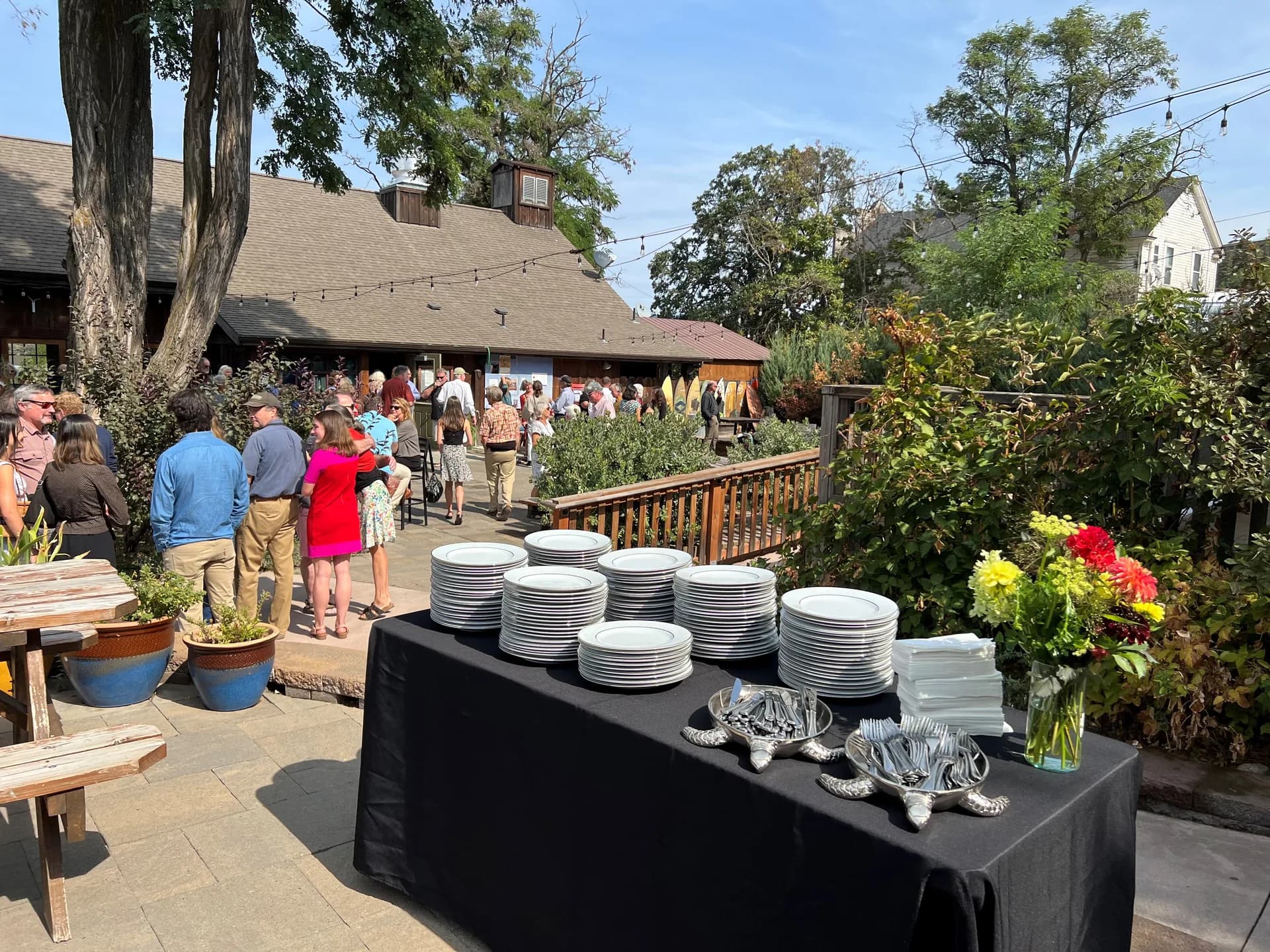 Elegant outdoor wedding event setup with string lights by Taste of Pearl
